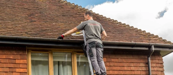 our team cleaning the gutters on a house in Stoke Bishop, Staffordshire